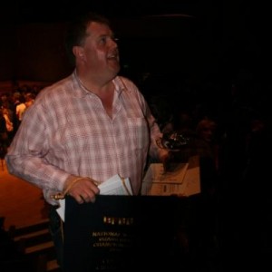 Jock with our trophy and banner