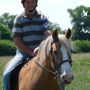 Poohsmate riding Beth